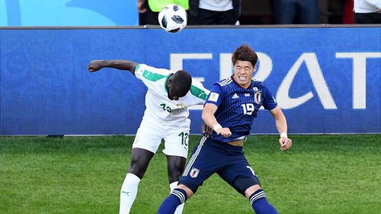 Africanos e asiáticos têm pouco espaço no futebol brasileiro (Foto: AFP/ANNE-CHRISTINE POUJOULAT)