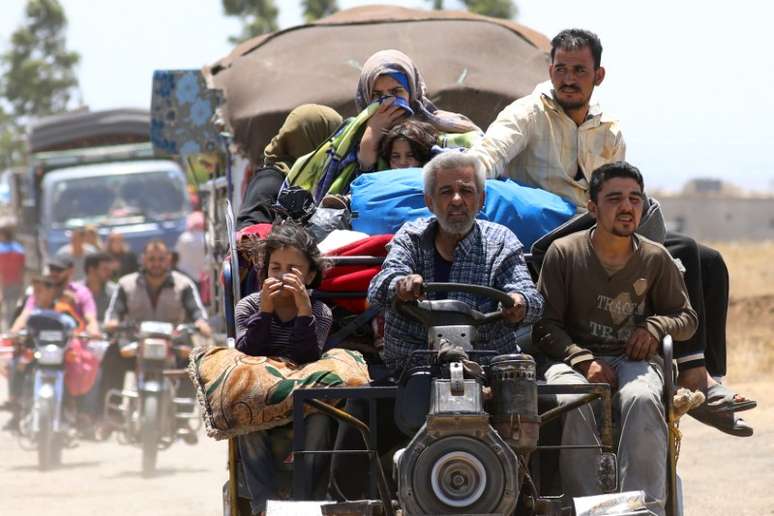 Moradores da cidade síria de Derra desclocadas pela guerra chegam a Quneitra 29/06/2018 REUTERS/Alaa Al-Faqir
