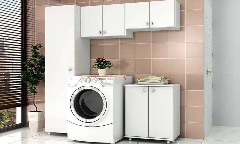 41. Lavanderia com arm&aacute;rios multiusos de formatos e tamanhos diferentes. Projeto de LojasKD