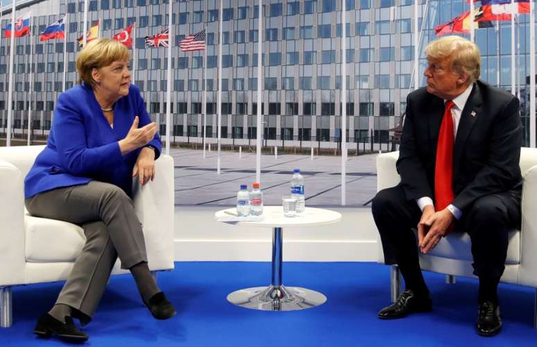 Presidente dos EUA, Donald Trump, se reúne com a chanceler alemã, Angela Merkel, durante reunião da Otan, em Bruxelas
11/07/2018
REUTERS/Kevin Lamarque