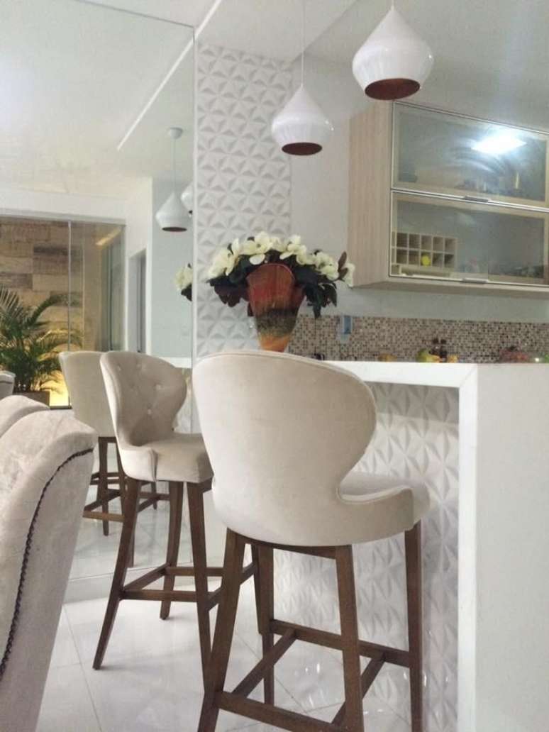 49. Algumas banquetas para cozinha tem o estilo de poltronas elegantes