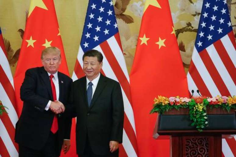 Os presidentes dos EUA, Donald Trump, e da China, Xi Jinping, durante reunião em Pequim