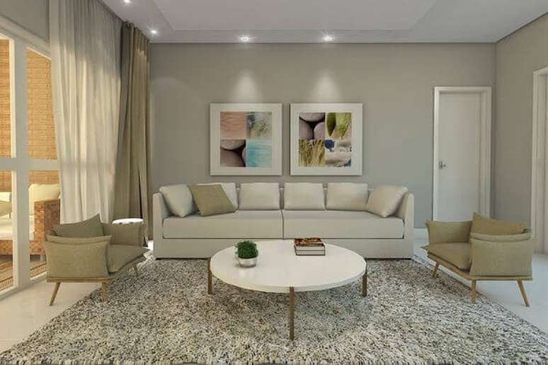 49 -As cores paras sala de estar pintada em tons claros deixam o ambiente bonito e sofisticado.