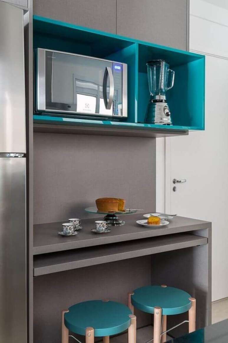 33. Escolha modelos coloridos de nichos decorativos para cozinha levando mais alegria e leveza ao ambiente