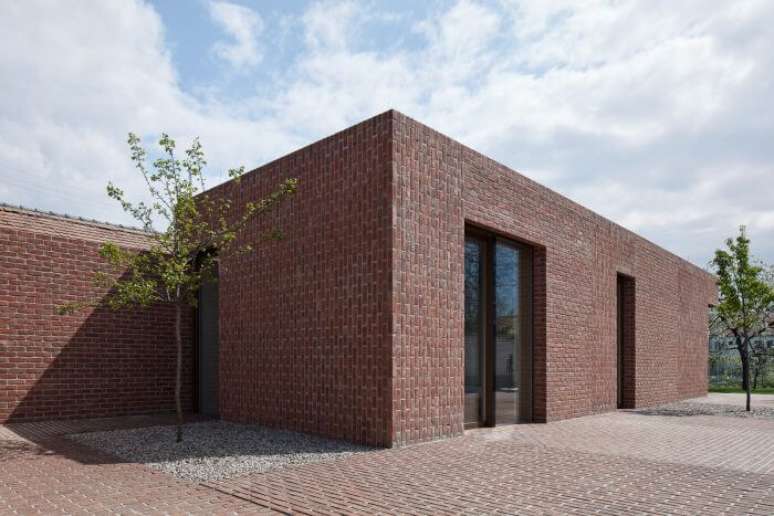 14. Casa de alvenaria minimalista com tijolos à vista