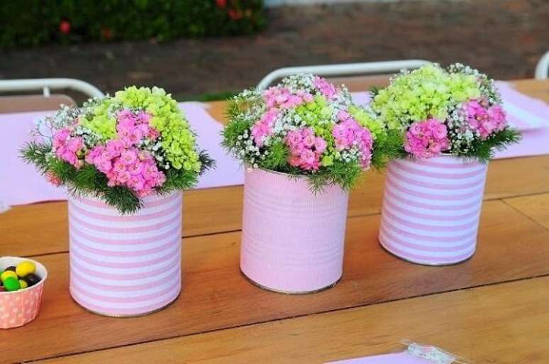 34- Latas decoradas de leite condensado para centro de mesa.