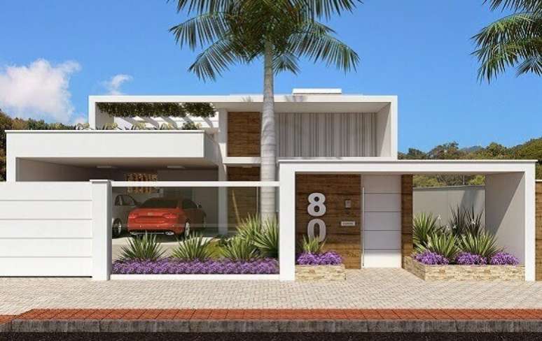 22- Arquitetura moderna prioriza muros de casas com linhas retas e transparência.