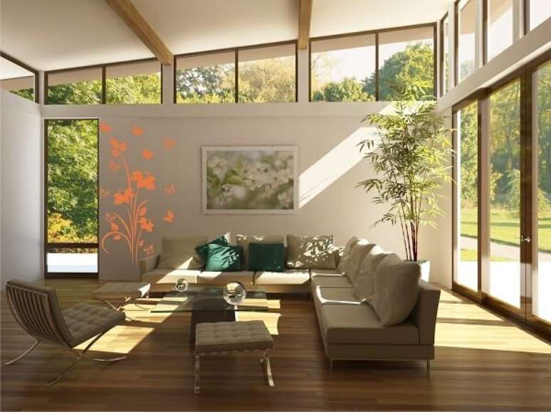 20 – Parede de vidro complementa a decoração da sala de estar.