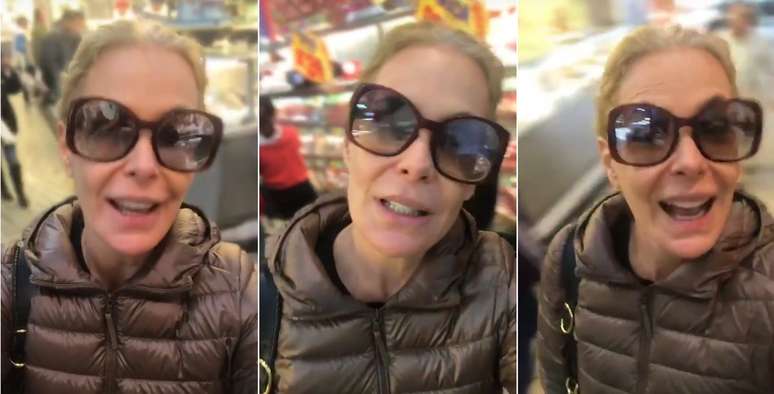 A atriz encheu as sacolas num mercado frequentado por populares