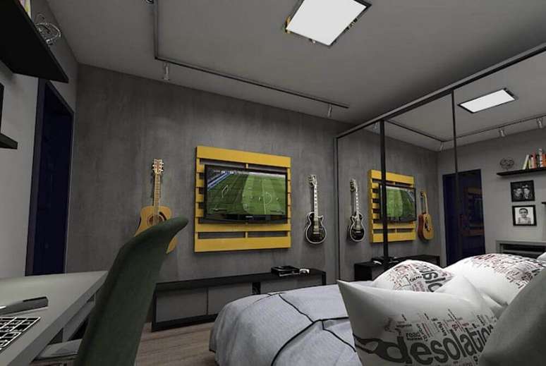5. Quarto moderno decorado com painel para TV de pallet pintado de amarelo – Foto: Home Decoo