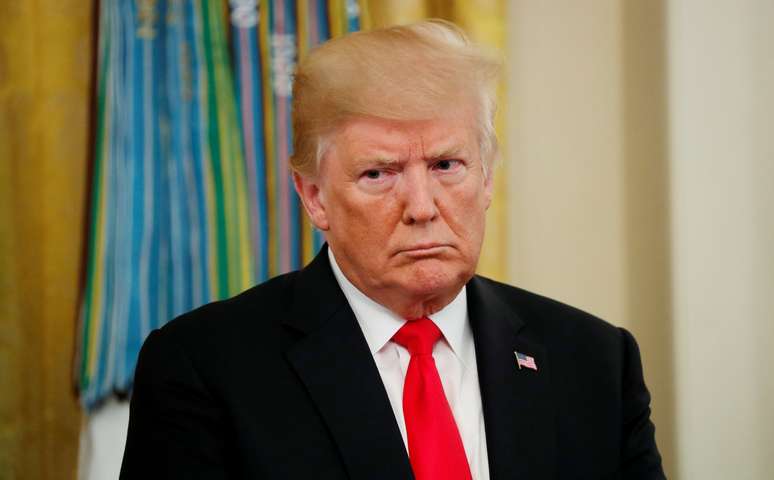 Trump durante cerimônia na Casa Branca
 22/8/2018   REUTERS/Kevin Lamarque 