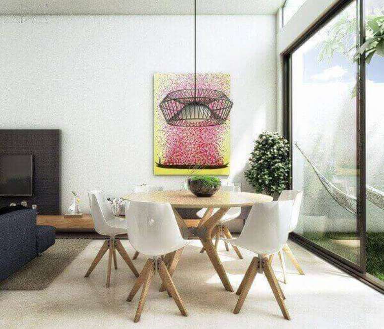 42- A mesa para sala de jantar e o jogo de cadeiras t&ecirc;m as bases trabalhadas em formas geom&eacute;tricas. Fonte: Ub&aacute; Arquitetura