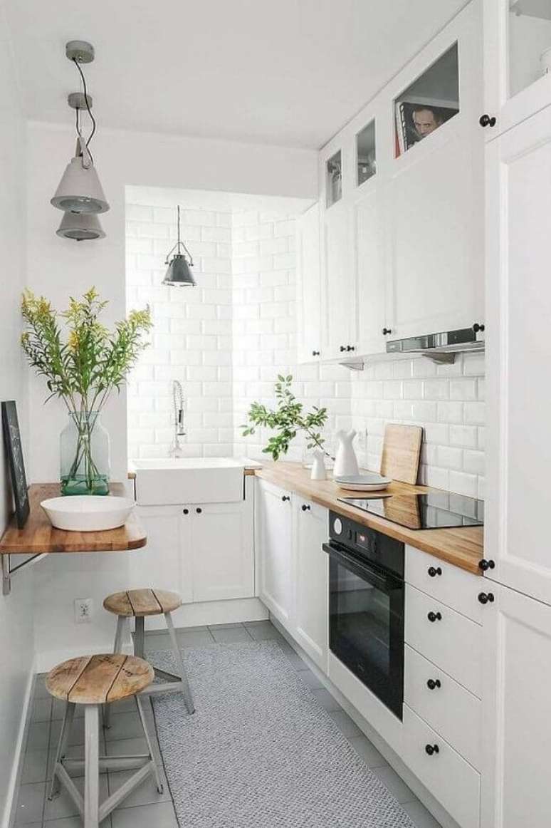34. Decoração para cozinha compacta com cooktop e modelos dobrável de mesa – Foto: Gescultura