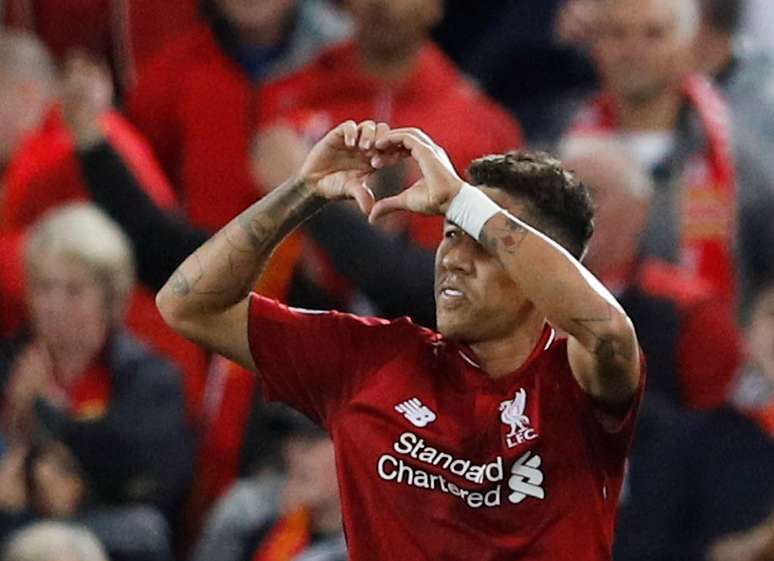 Firmino comemora gol do Liverpool sobre o Paris St Germain
 18/9/2018    REUTERS/Phil Noble 