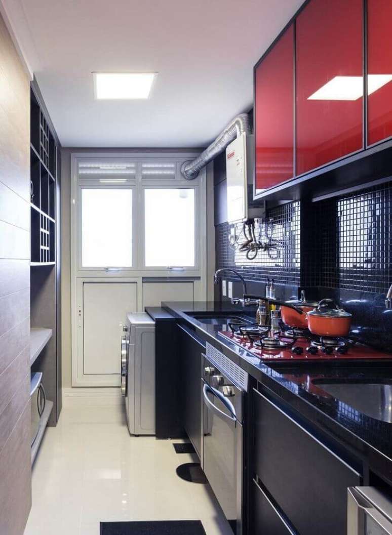 5. Para um ambiente mais bonito e bem decorado, invista em um projeto planejado de lavanderia com cozinha integrada – Foto: Pinterest