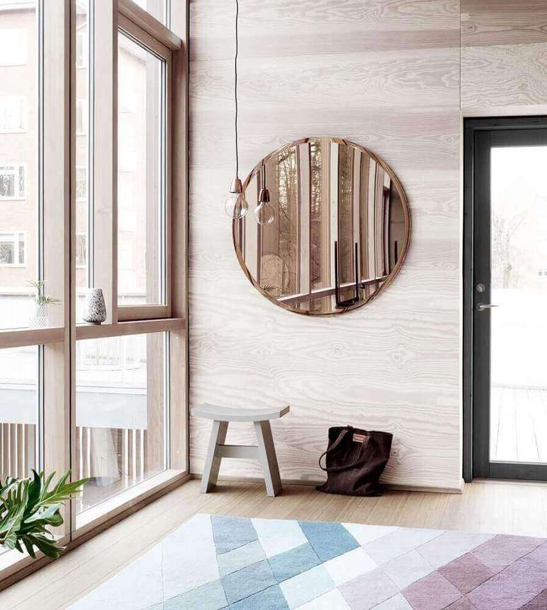 35. Decora&ccedil;&atilde;o minimalista com modelo redondo de espelho bronze &ndash; Foto: Pinterest