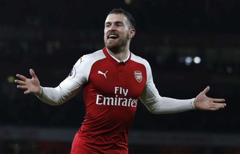 Ramsey está desde 2008 no clube inglês e já soma mais de 330 partidas (Foto: Adrian Dennis / AFP)