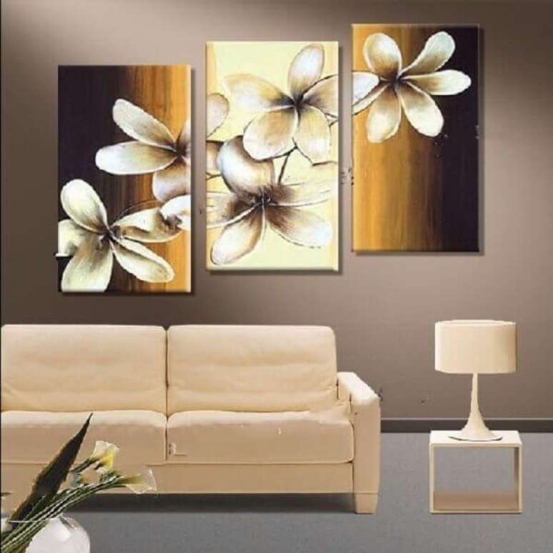 10 – Os quadros com as imagens de flores lindas completam a decoração da sala de estar. Fonte: Eflfurniture