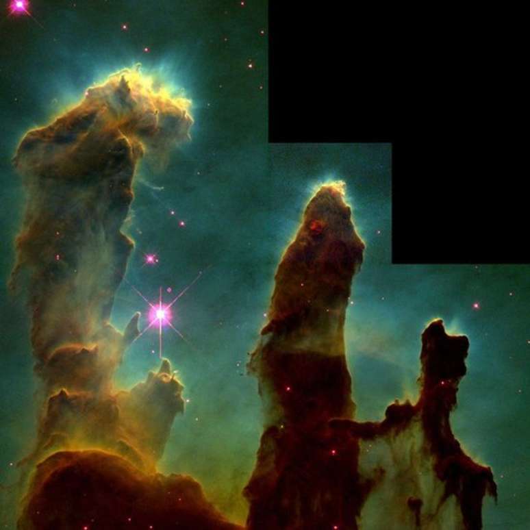 Os 'Pilares da Criação': a imagem foi feita pelo Hubble em 1995 e mostra colunas de gás e poeira na Nebulosa da Águia, uma cadeia de estrelas a uns 7 mil anos-luz da Terra
