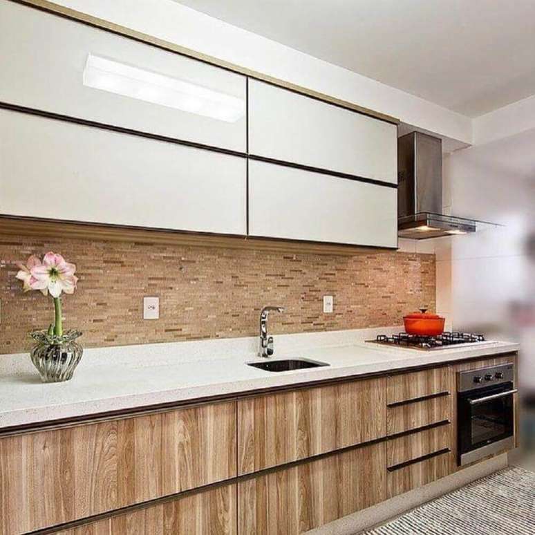 18. Modelo de armário de cozinha planejado em marcenaria – Foto: Mendonça Pinheiro Interiores