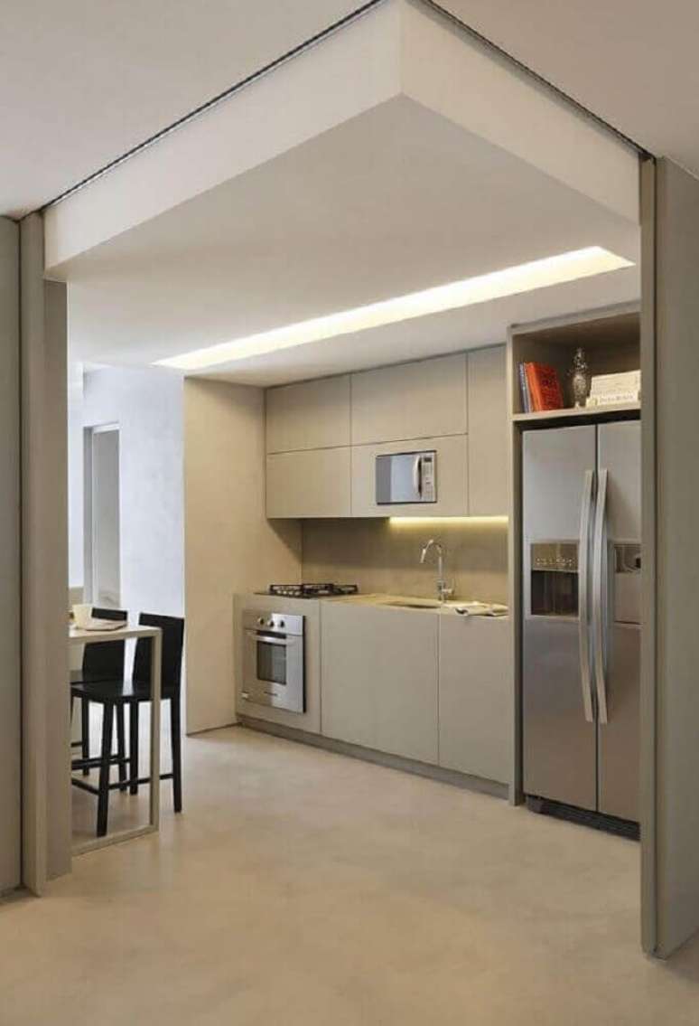 71. Decoração minimalista com armário planejado para cozinha pequena – Foto: Pinterest