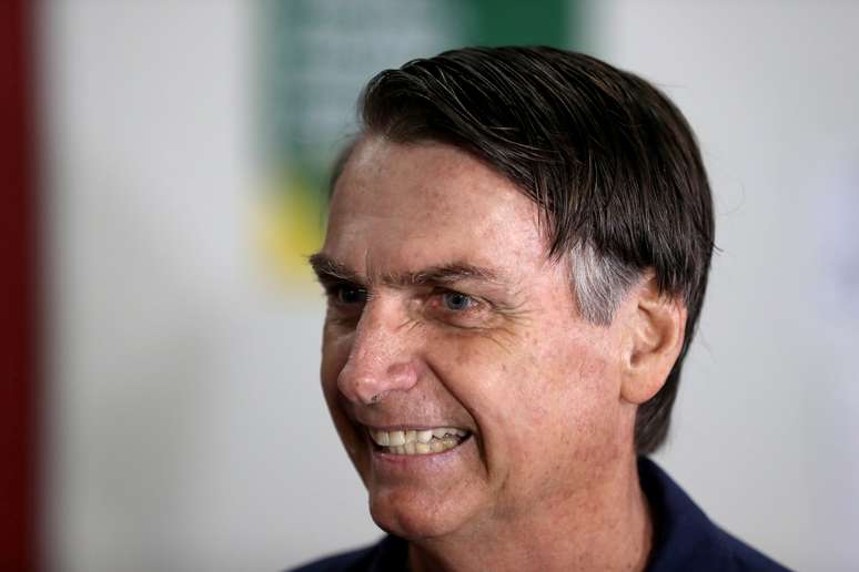 Candidato do PSL à Presidência, Jair Bolsonaro, chega para votar no Rio de Janeiro
07/10/2018 REUTERS/Ricardo Moraes