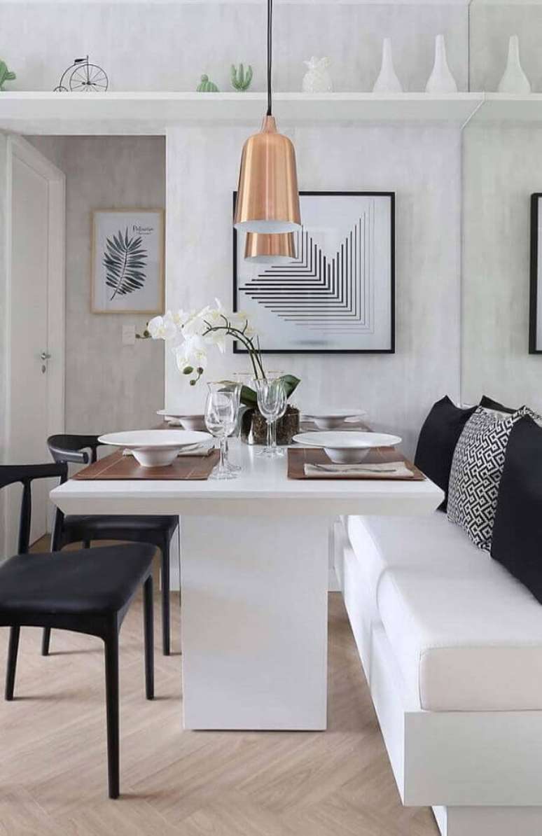 27. O pendente para sala de jantar moderna trás um charme super especial para a decoração do ambiente – Foto: The Holk