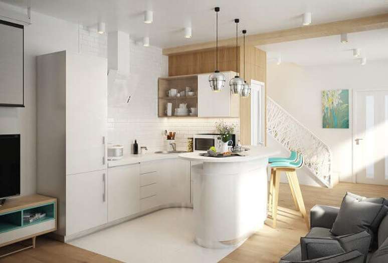 16- Na cozinha americana pequena com sala simples foram utilizadas as linhas modernas e curvas. Fonte: Pinterest
