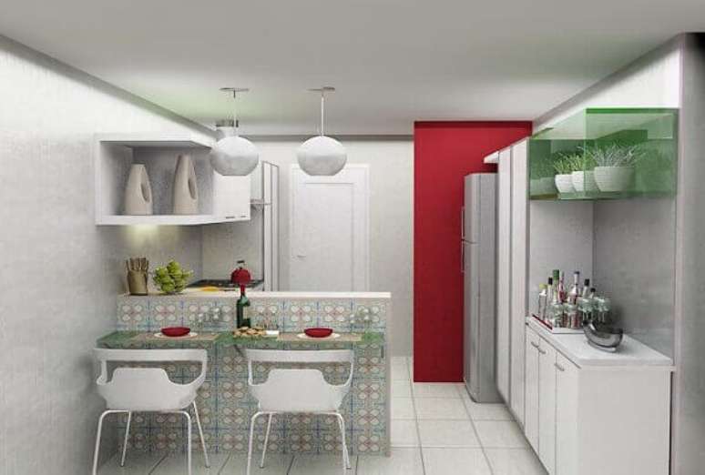 59- Os blocos de vidro vazados formam a bancada que divide a cozinha americana pequena simples da sala. Fonte: Urbaville