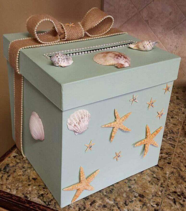 26. Caixa de madeira decorada com conchinhas e estrelas do mar – Foto: Kadoka