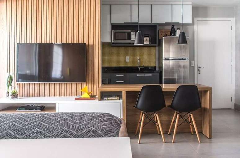 77. Decoração para cozinha planejada para apartamento pequeno com sala de estar integrada – Foto: Danyela Corrêa
