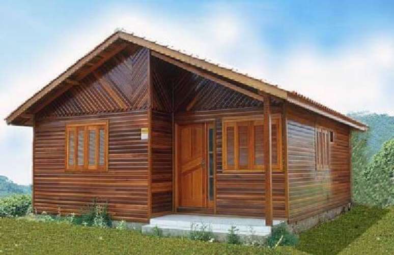 43. Casa pré-fabricada de madeira com janelas e porta do mesmo material