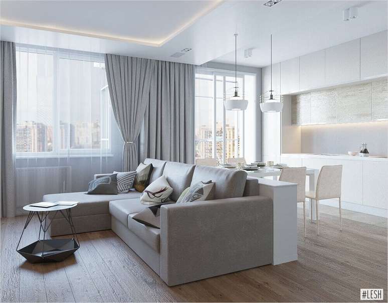 44. Decoração minimalista e clean com sofá cinza e armários brancos planejados para cozinha integrada com sala de estar – Foto: Pinterest