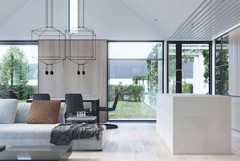 64. Luminárias de teto com design arrojado para decoração de sala de estar ampla integrada com cozinha e sala de jantar – Foto: Wisozk