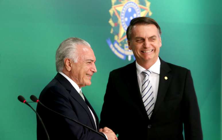 O ex-presidente da República, Michel Temer (MDB), e o presidente Jair Bolsonaro durante declaração conjunta no Palácio do Planalto, em Brasília