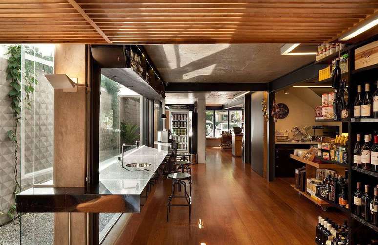 29. Loja com piso de madeira e decora&ccedil;&atilde;o moderna. Projeto de ODVO Arquitetura