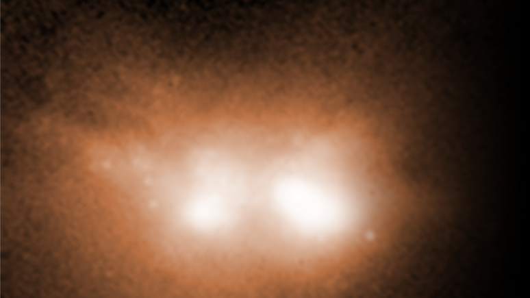 Imagem registrada pelo Telescópio Espacial Hubble mostra a fusão de duas galáxias