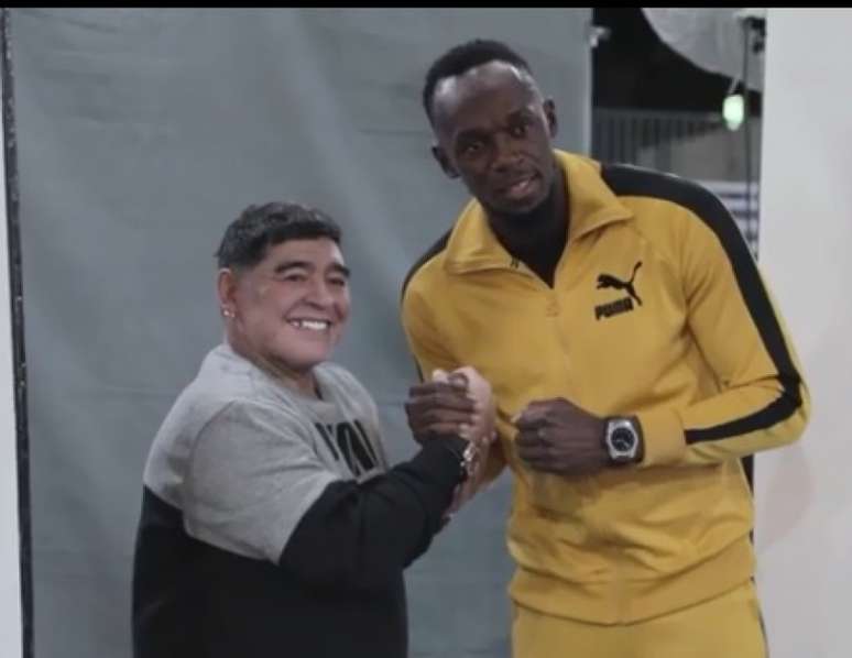 Bolt e Maradona se conhecem de eventos publicitários (Foto: Reprodução)
