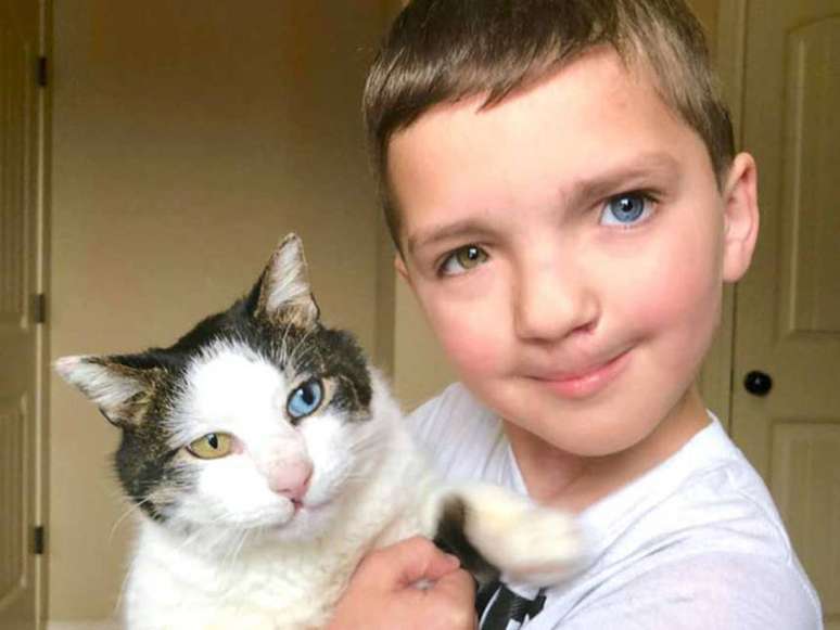O garoto Madden, de sete anos, e seu gatinho Moon.