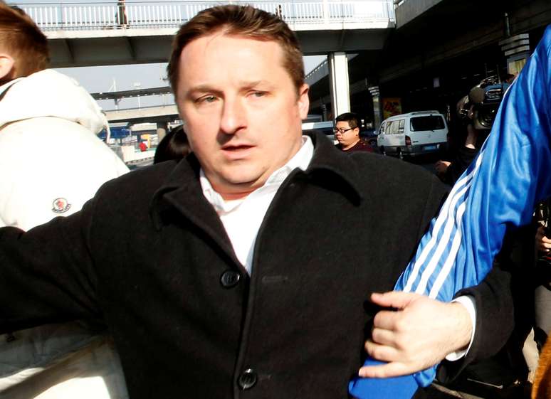 Empresário canadense Michael Spavor no aeroporto de Pequim 13/01/2014 REUTERS/Kim Kyung-Hoon