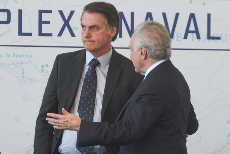 O presidente da República Michel Temer (MDB) e o presidente eleito Jair Bolsonaro (PSL) durante a cerimônia de batismo e lançamento ao mar do Submarino Riachuelo