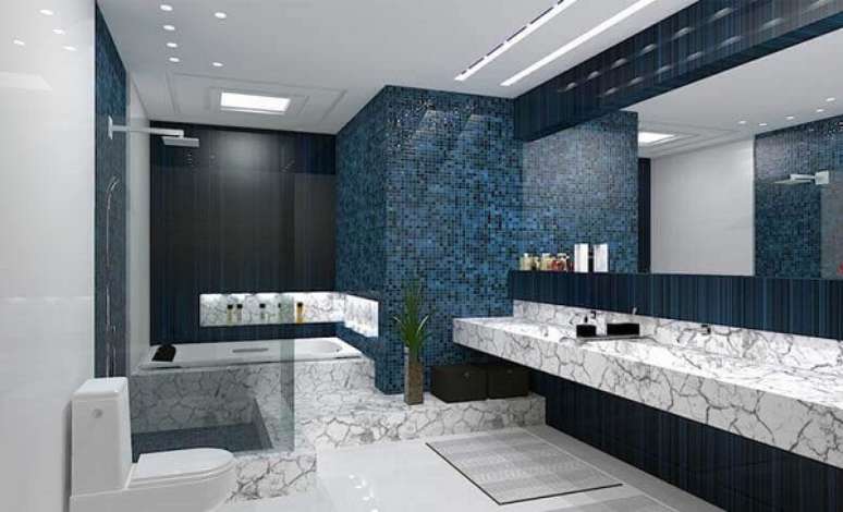 42- No banheiro o teto de gesso tem iluminação sobre a bancada dentro da banheira e sobre o vaso e chuveiro. Fonte: Solara Engenharia