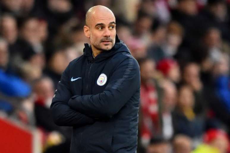 Guardiola durante vitória sobre o Southampton neste domingo (Foto: Glyn Kirk / AFP)