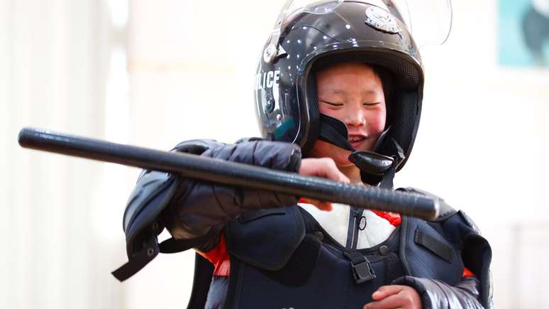 Apesar das mudan&ccedil;as no &uacute;ltimo ano, o sonho de Wang continua o mesmo: ele quer ser policial quando crescer