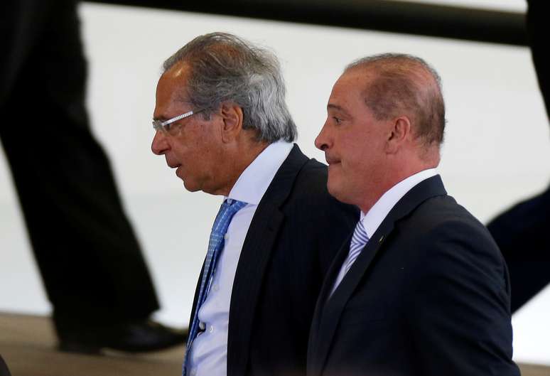 Brazil's Economy Minister Paulo Guedes and Chief of Staff Minister Onyx Lorenzoni arrive to a ceremony at the Planalto Palace in Brasilia, Brazil January 7, 2019. REUTERS/Adriano Machado