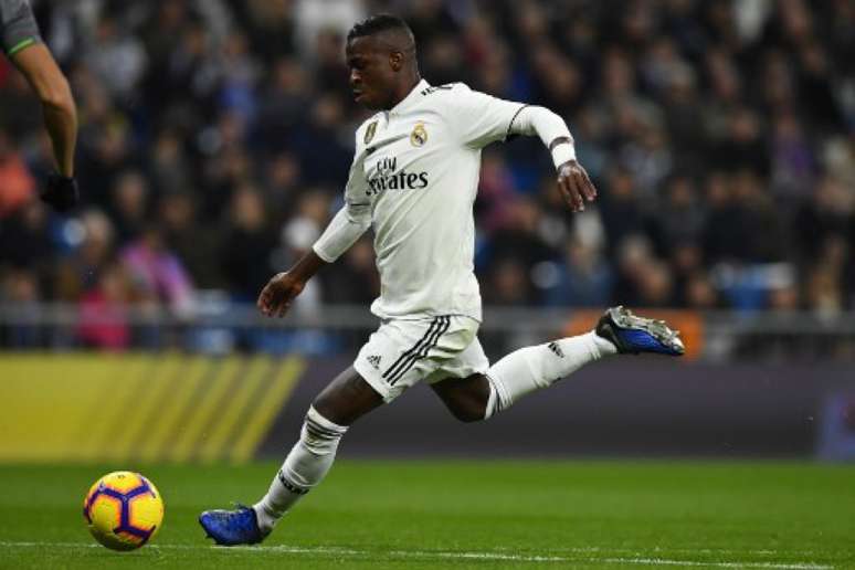 Vinícius Júnior precisa de 12 chutes para fazer um gol pelo Real Madrid (Foto: Gabriel Bouys / AFP)