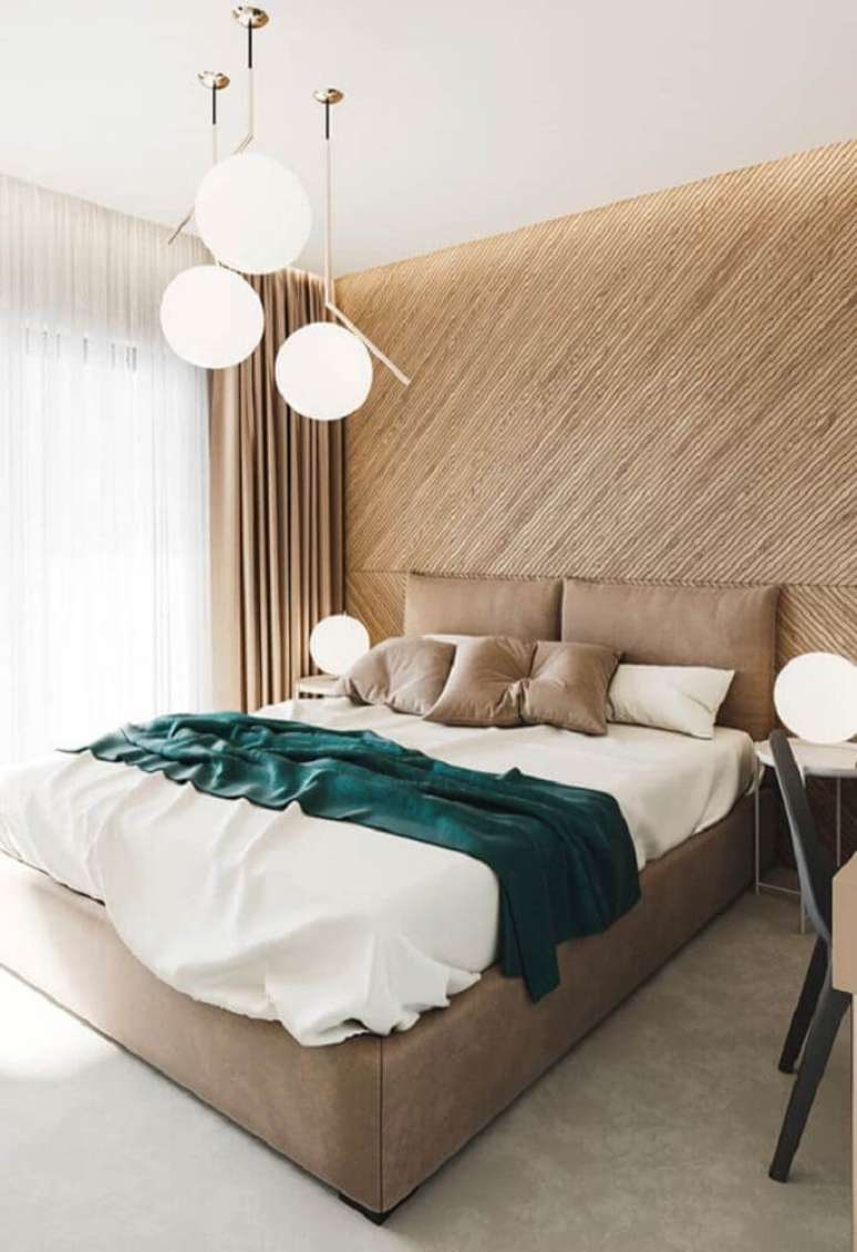 20. Decoração em tons neutros para quartos de casal modernos com luminárias redondas sobre a cama – Foto: Pinterest