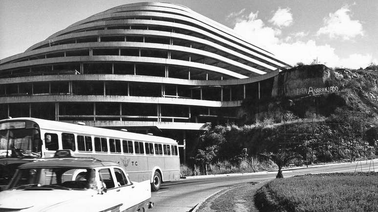 This space-age building was carved into the rock with ramps spiralling up past 300 planned boutiques