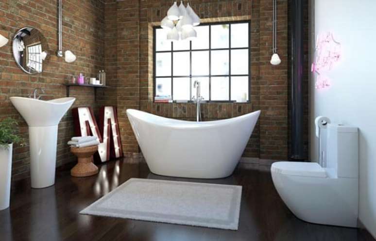 54- No ambiente moderno com louças brancas, o tapete branco e gelo complementam a decoração. Fonte: Bathrooms