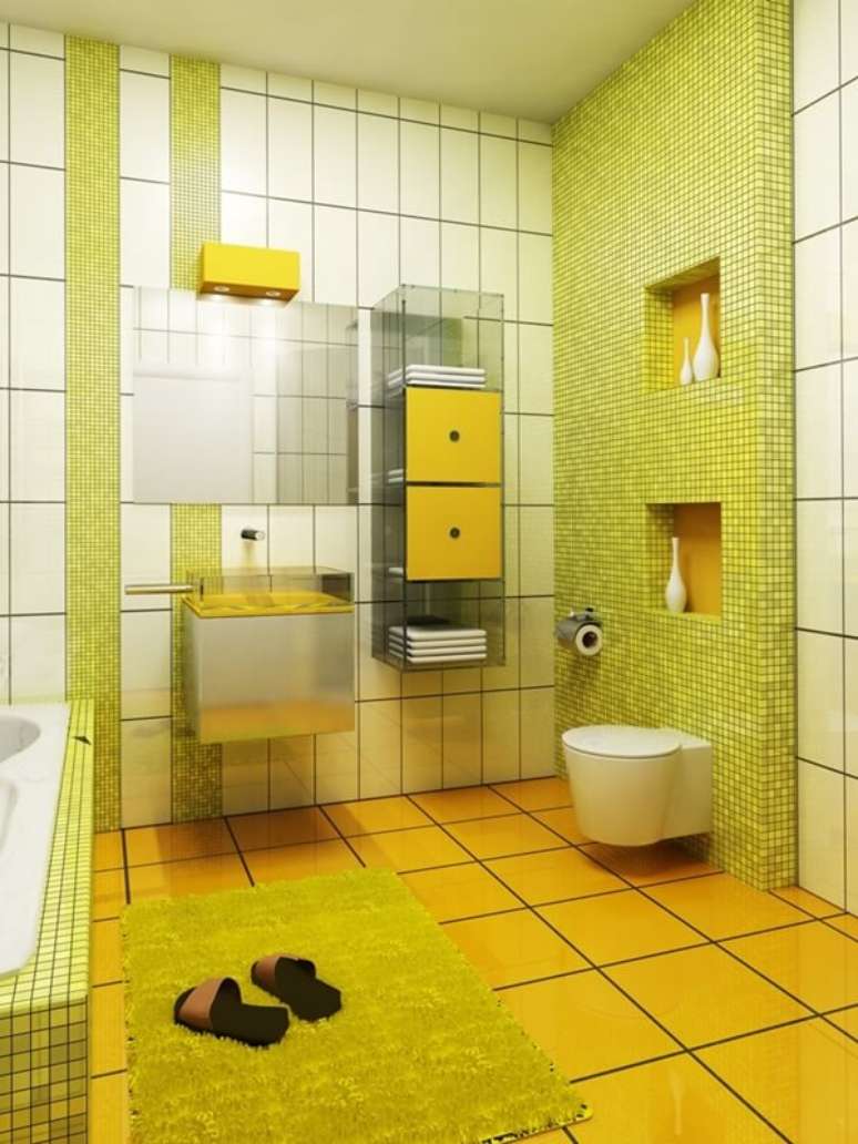 59- O tapete para banheiro verde limão combina com as pastilhas da parede. Fonte: Hative